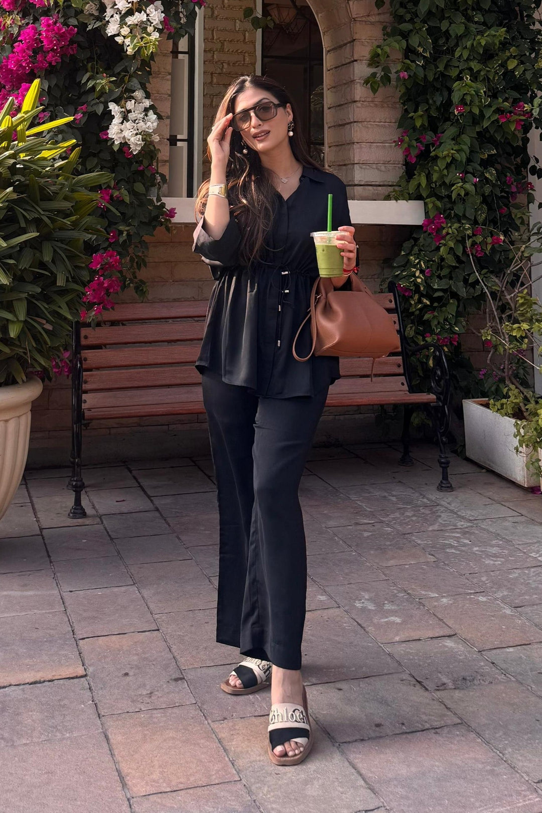 Woman wearing the Riviera black co-ord set