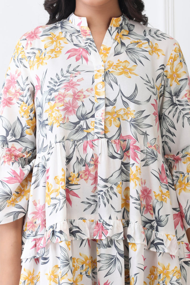 Floral patterned shirt with colorful design on a white background