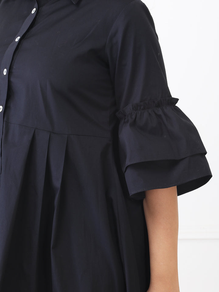Black dress with ruffled sleeves on a white background
