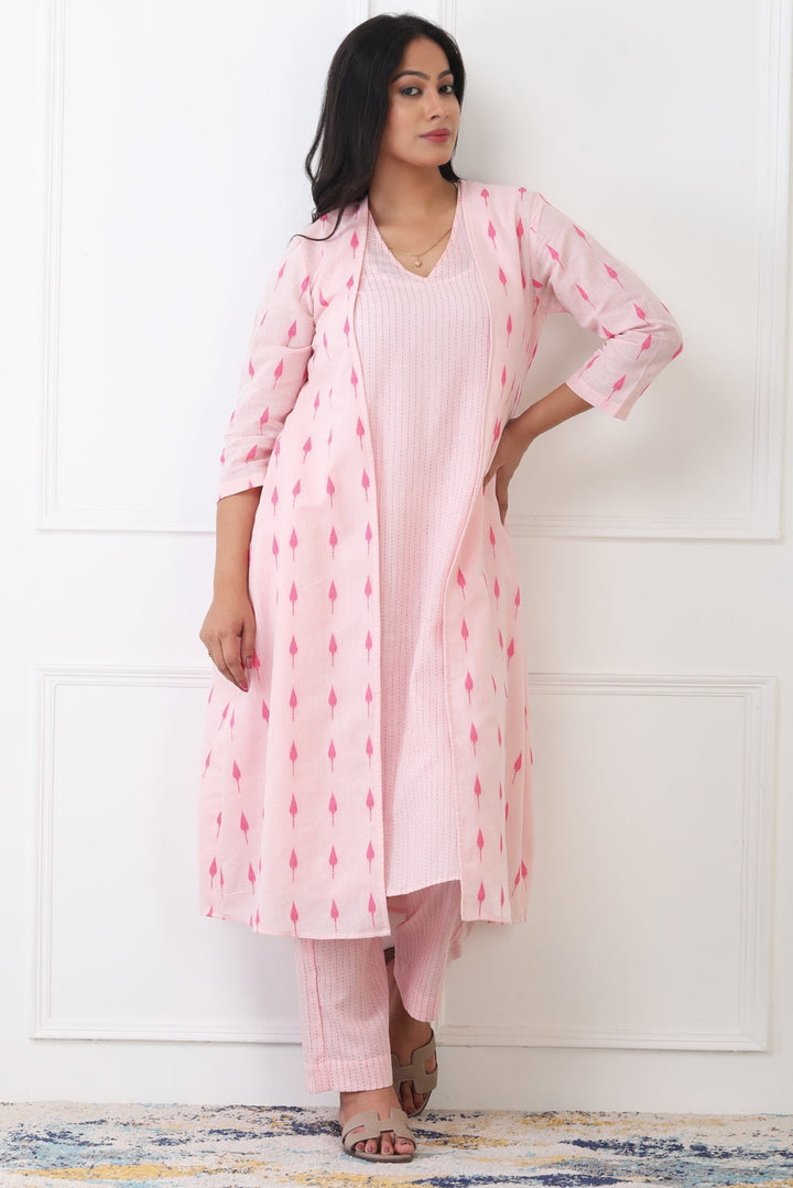 Woman wearing a pink traditional outfit with a white background
