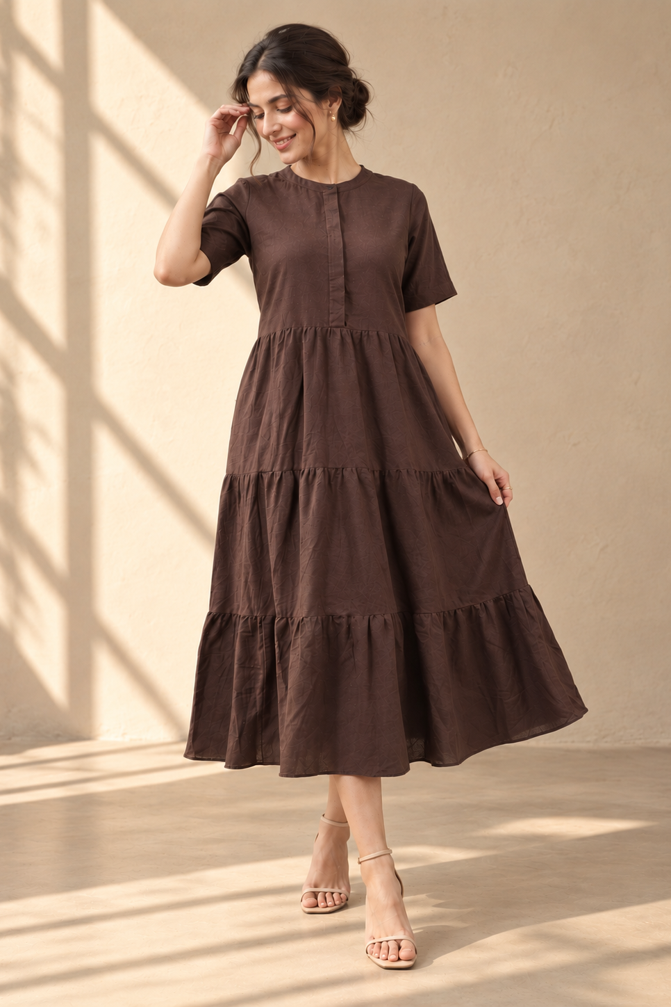 Woman wearing the Ines – Cotton-Linen Tiered Dress in Dark Brown, view 4