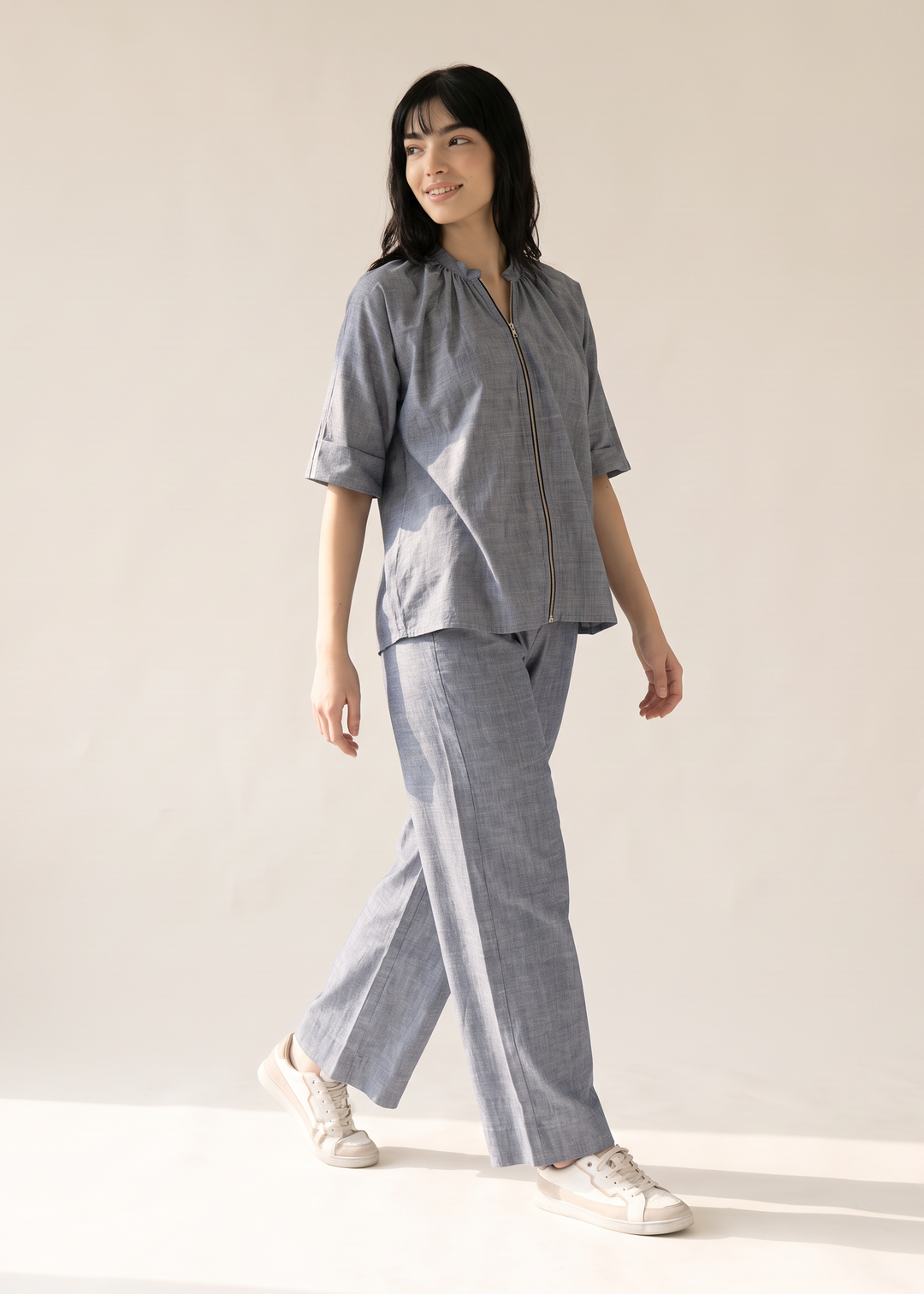Margot co-ord set in motion, showing the drape of the wide-leg trousers